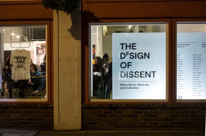 Display of The Design of Dissent exhibition poster and T-shirt, featuring thought-provo...