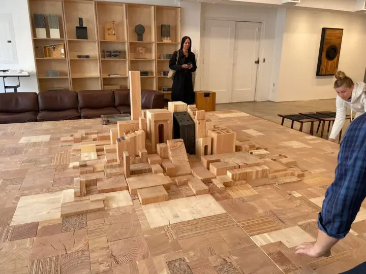 Raya Leary at the Olson Kundig New York City office viewing their monumental wooden cit...