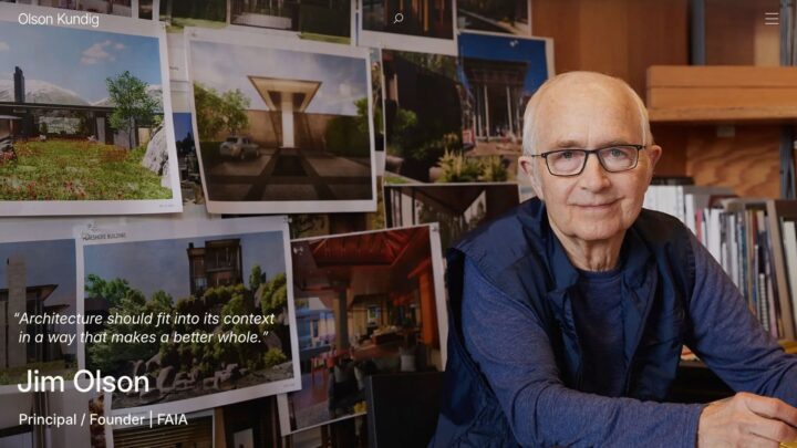 Architect at desk with design photos; text: Architecture should fit into its context......