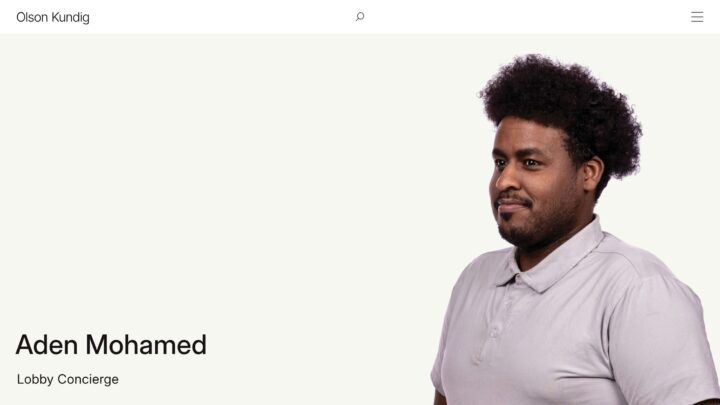 I'm sorry, I don't know who this person is. For the alt text: Portrait of a lobby conci...