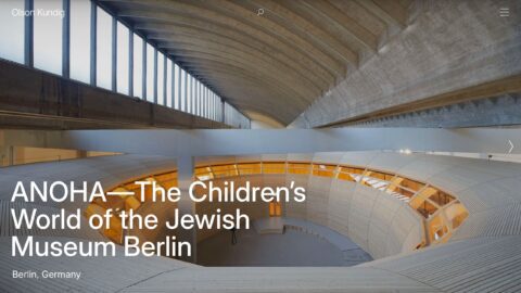 Interior view of ANOHA, the Jewish Museum Berlin's children's world, showcasing modern architectural design with curved structures.