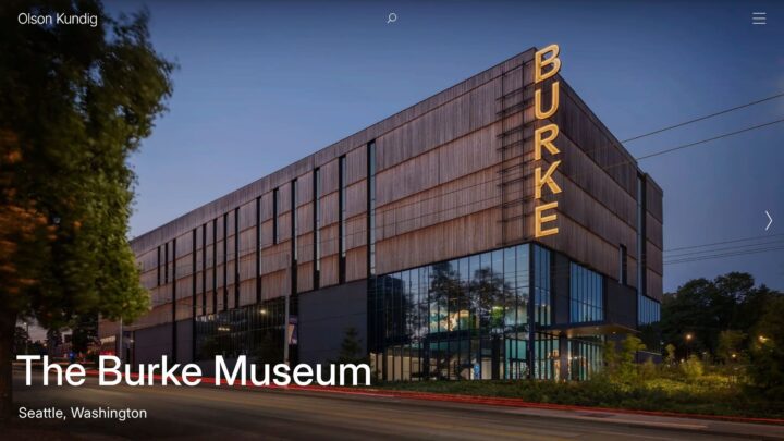 Exterior view of the modern Burke Museum in Seattle during dusk, showcasing its illumin...