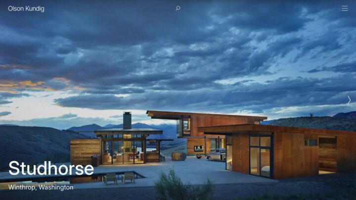 Modern architectural home Studhorse in Winthrop, WA, under a dramatic cloudy sky, showc...