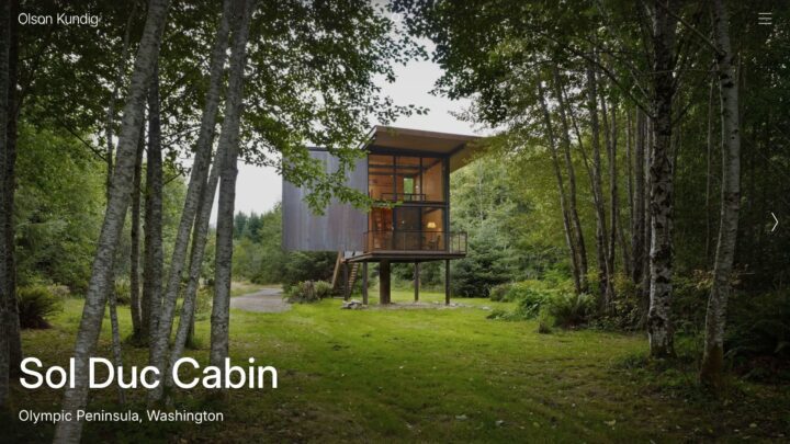 Modern Sol Duc Cabin surrounded by lush forest in Olympic Peninsula, Washington. Elevat...