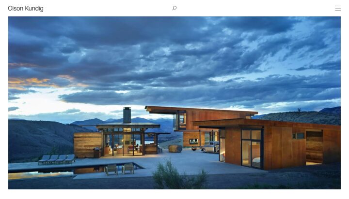 Modern hillside home with dramatic sky and mountain views, featuring sleek architecture...