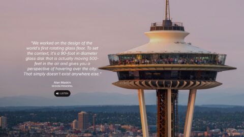 Space Needle at dusk with tourists on the rotating glass floor, offering stunning city views and unique perspective in Seattle.