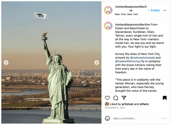 Statue of Liberty with floating artwork in NYC sky, symbolizing solidarity with Iranian...