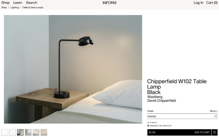 Black Chipperfield W102 Table Lamp on a wooden bedside table, modern and minimalist des...