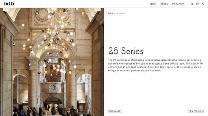 Modern interior with colorful pendant lights from Bocci's 28 Series, enhancing a grand ...