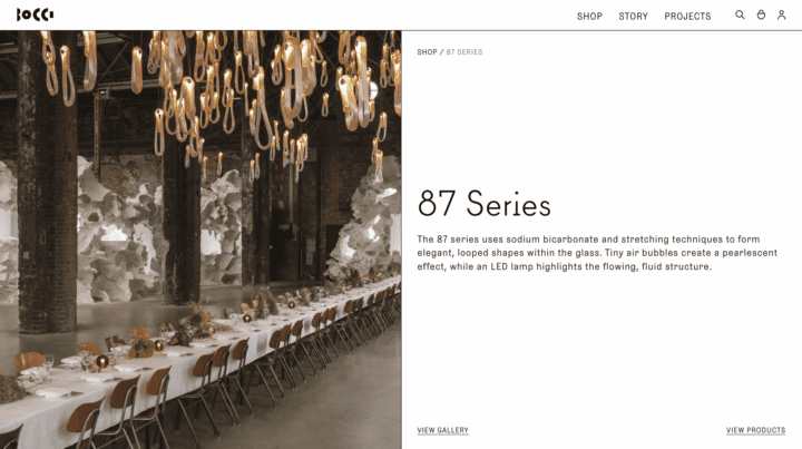 Elegant dining setup under Bocci 87 Series looped glass art lighting, creating a mesmer...