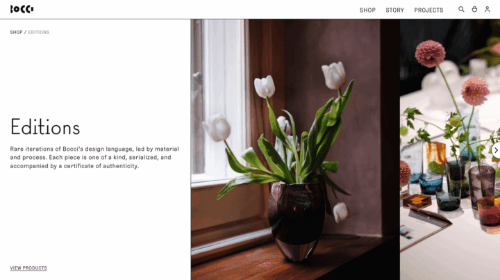 Elegant interior with white tulips in a vase, colorful glassware, showcasing Bocci's un...