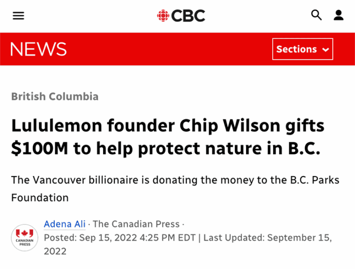 A man and woman at a podium, discussing a $100M donation to B.C. Parks Foundation.