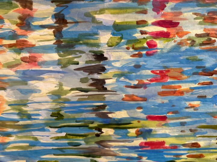 Abstract watercolor painting with colorful brushstrokes blending blues, greens, reds, a...