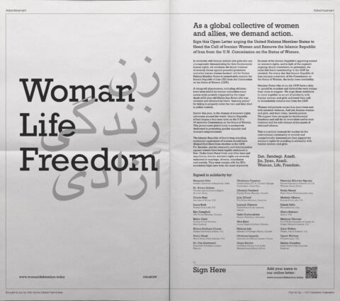 Black and white newspaper ad with Woman Life Freedom text, advocating for women's rights and global solidarity.