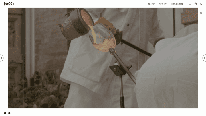 Glassblowing artist pouring molten glass from a crucible, showcasing the intricate craf...