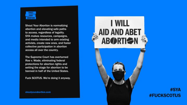 Protest sign reading I Will Aid and Abet Abortion, with Shout Your Abortion text on the...